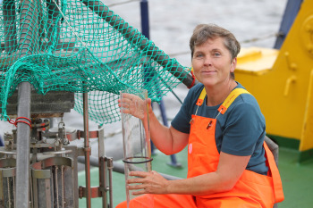 Maren Voß taking sediment samples at sea