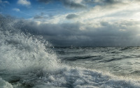 Photo of turbulent waves on the Baltic Sea during stormy weather.