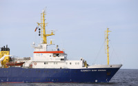 The IOW research vessel ‘Elisabeth Mann Borgese’ on the Baltic Sea with the official logo of the UN Ocean Decade.
